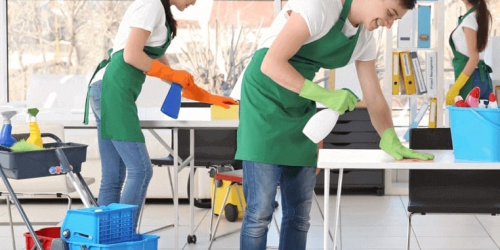 Cleaners cleaning an office