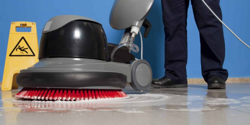 cleaning floor with machine